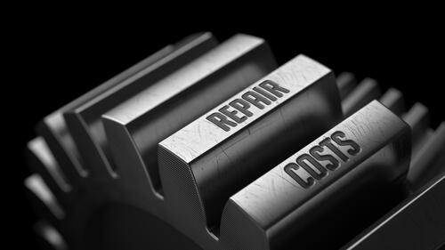 歯車と「リペア」「コスト」の文字の写真