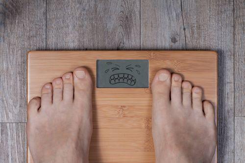 体重計にのっているところの写真